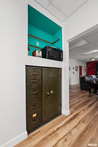 a view of a balcony with a floor to ceiling window