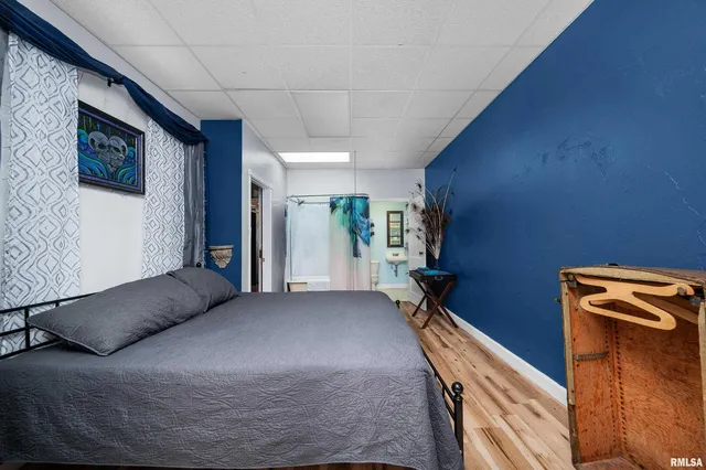 a kitchen with stainless steel appliances granite countertop a refrigerator a stove and a sink