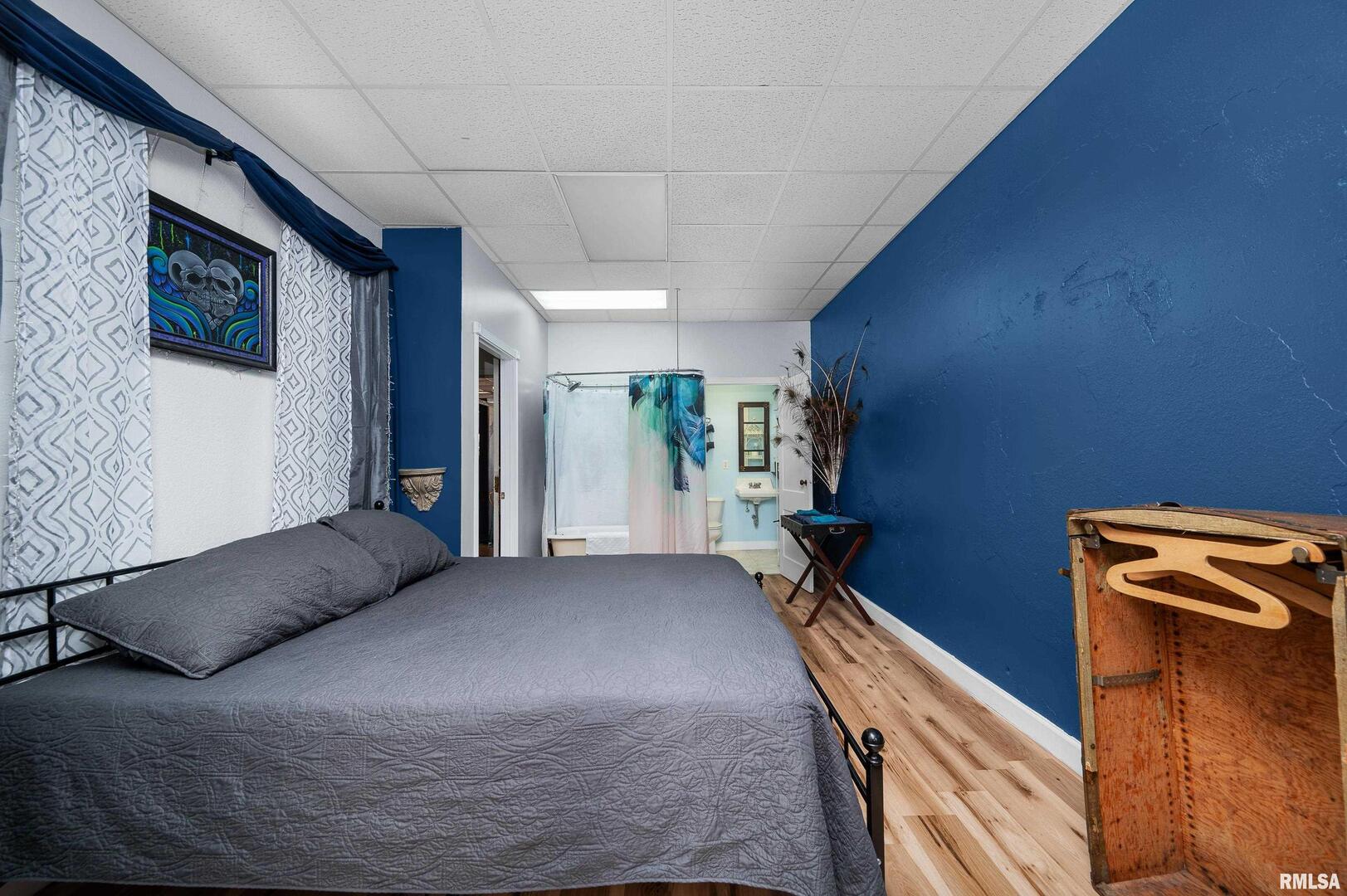 309 Main Street Savanna, IL 61074 - Photo 28 of 58 a bedroom with a bed and a window