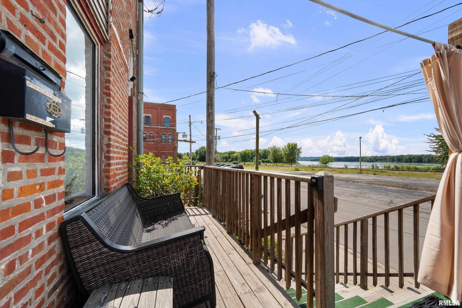 309 Main Street Savanna, IL 61074 - Photo 32 of 58 a view of a balcony with furniture