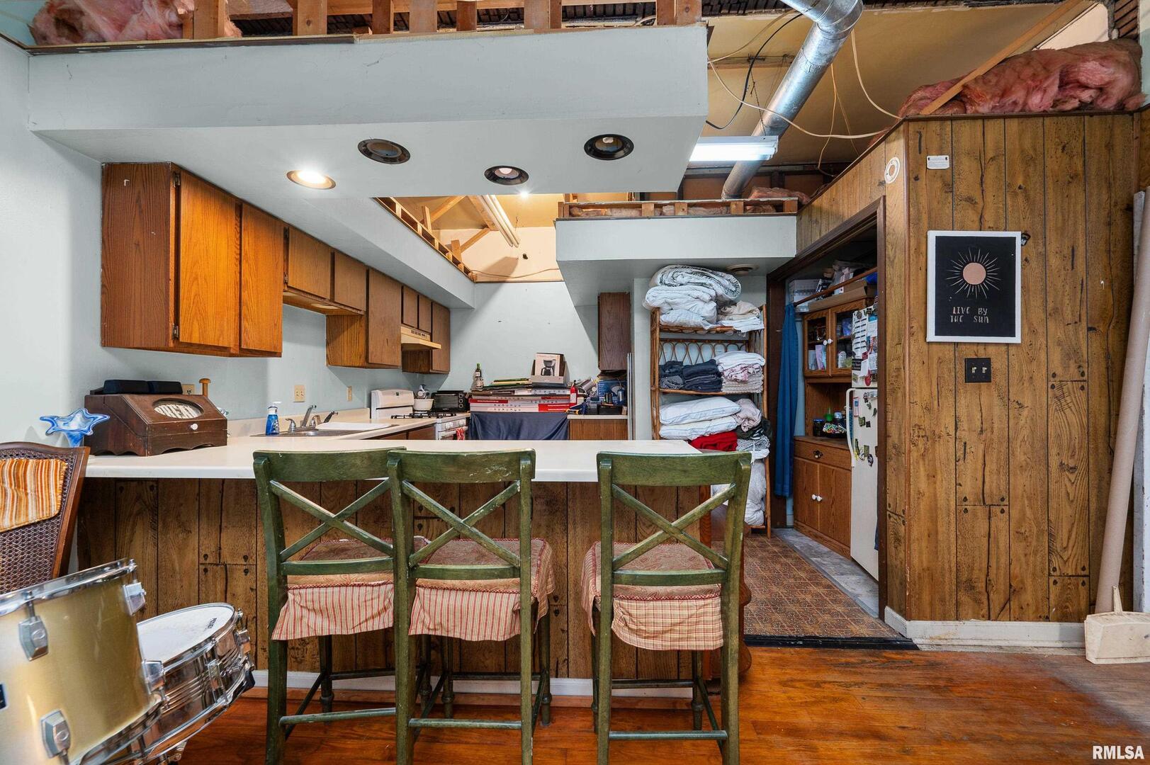 309 Main Street Savanna, IL 61074 - Photo 45 of 58 a view of a dining room with furniture and wooden floor