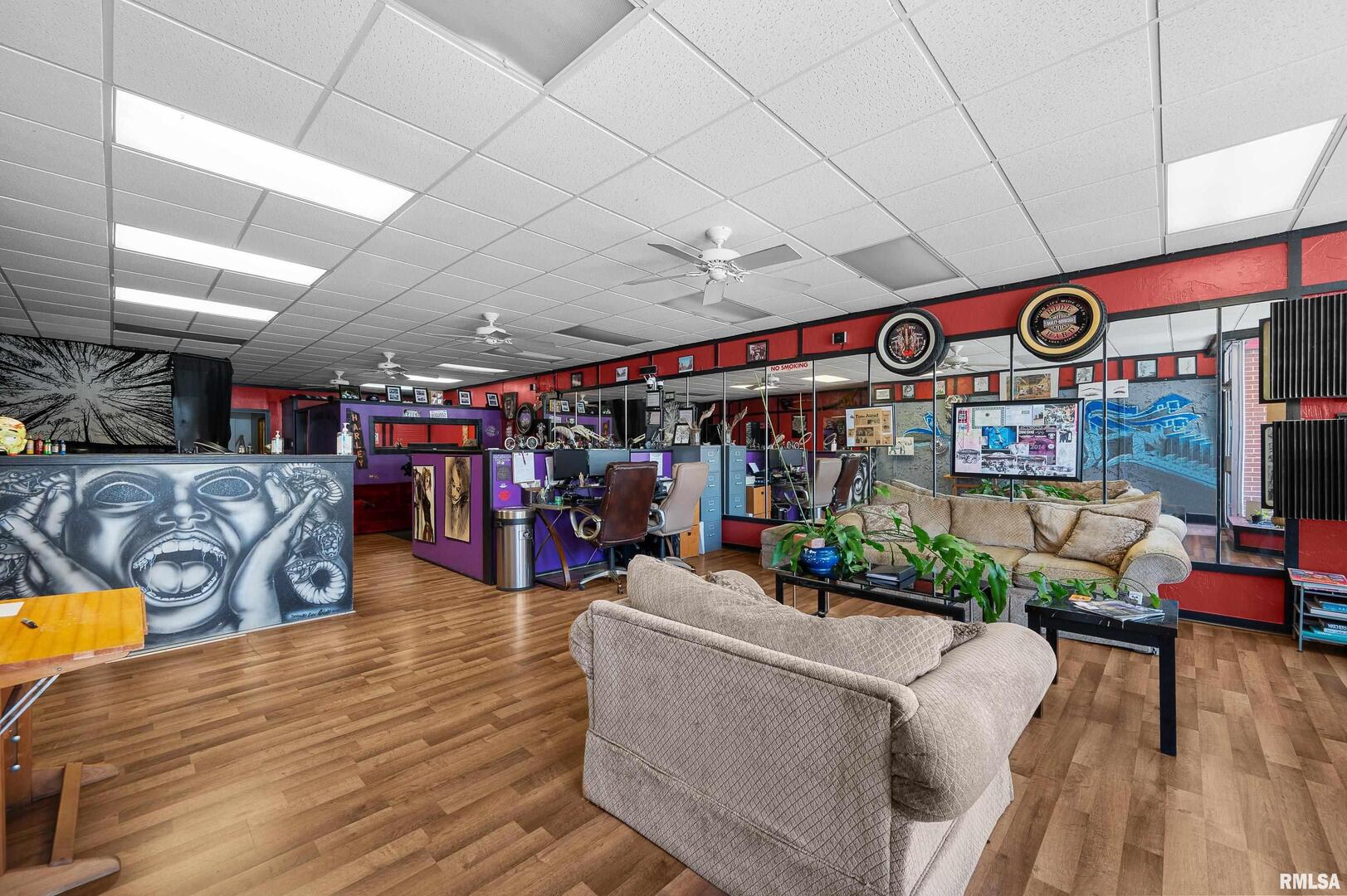 309 Main Street Savanna, IL 61074 - Photo 9 of 58 a view of a room with lots of furniture and lots of wooden floor