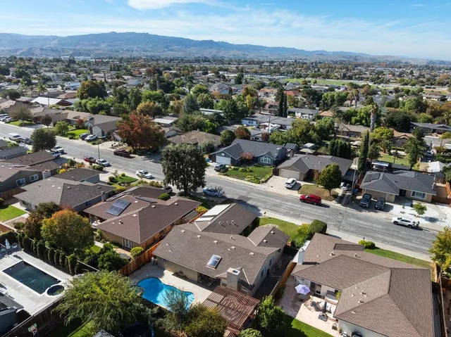 an aerial view of a city with lots of residential buildings