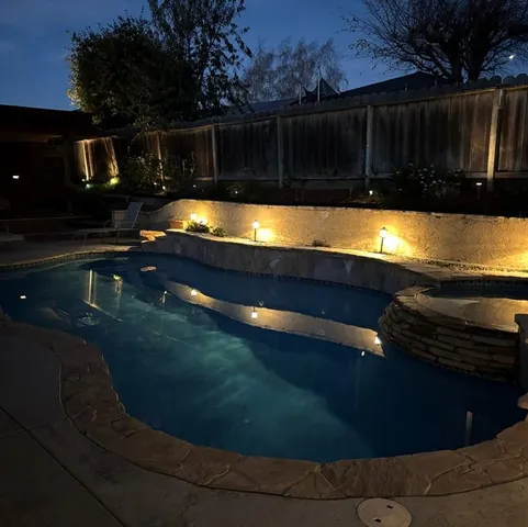 a view of balcony with furniture