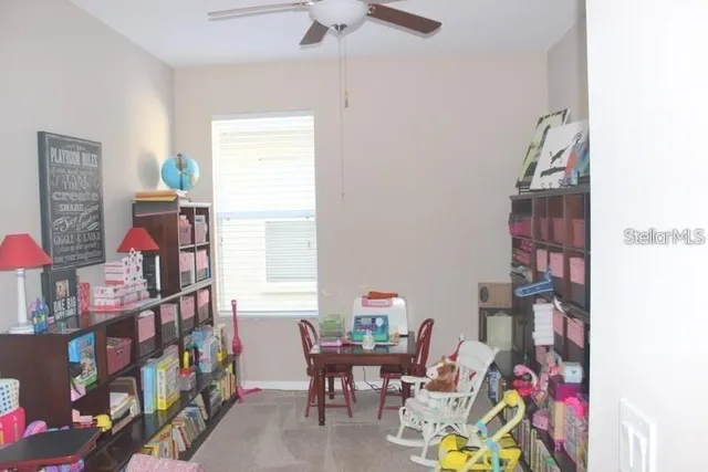 a bedroom with furniture and a bed