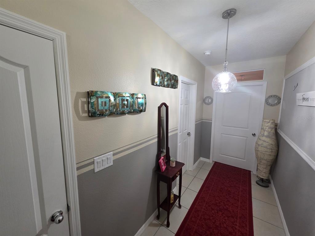 981 Chanler Drive Haines City, FL 33844 - Photo 3 of 11 a view of a hallway with elevator