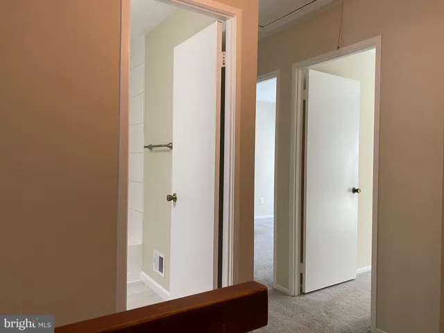 a view of a hallway with closet