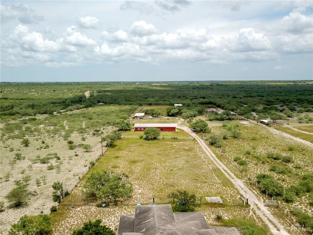 9 San Julian Road Roma, TX 78584 - Photo 20 of 28 a swimming pool with lawn chairs