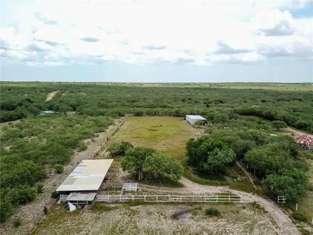 a view of a yard with an outdoor space