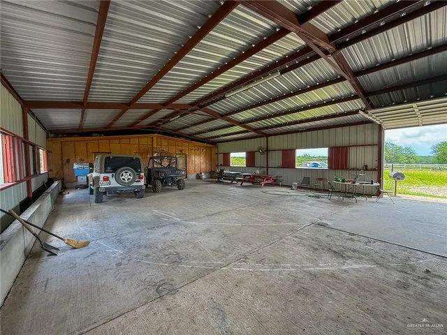 a view of parking garage with car parked