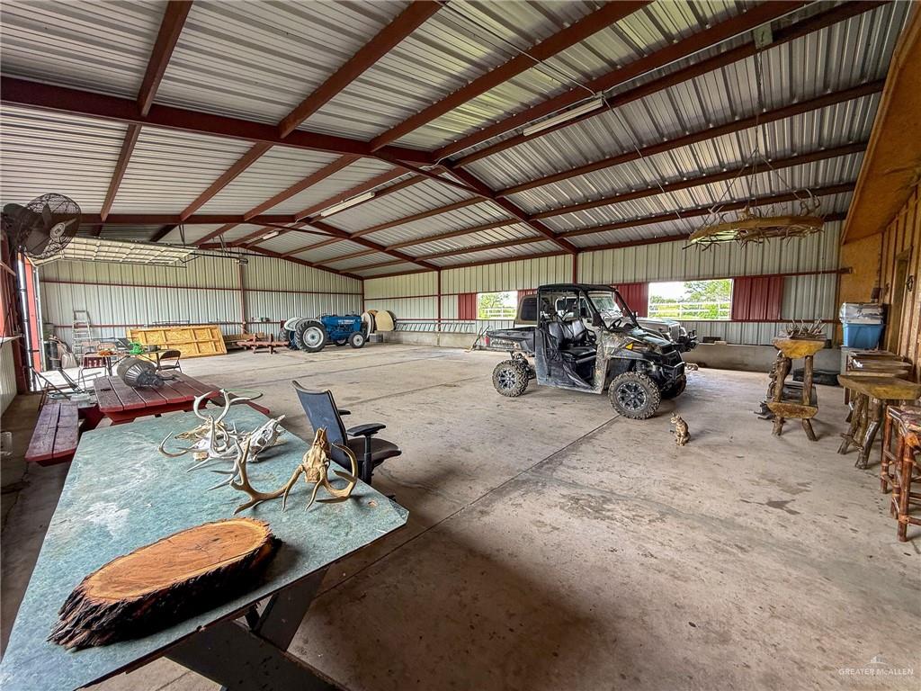 9 San Julian Road Roma, TX 78584 - Photo 6 of 28 a view of parking garage with cars parked