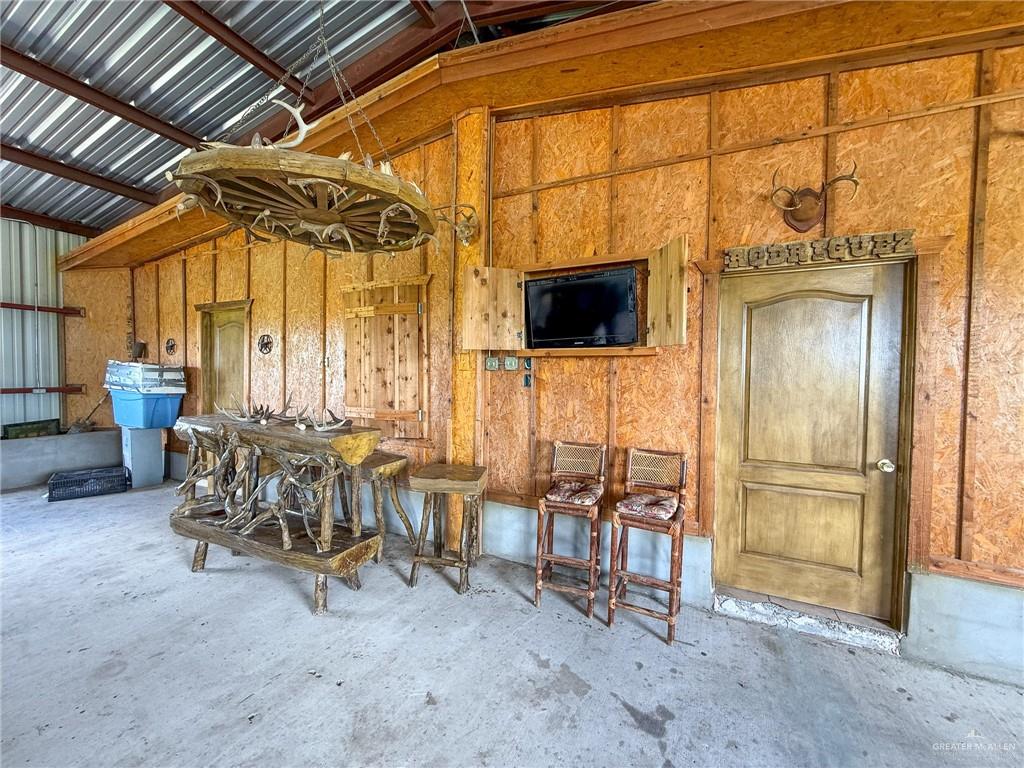 9 San Julian Road Roma, TX 78584 - Photo 7 of 28 a living room with furniture and a flat screen tv