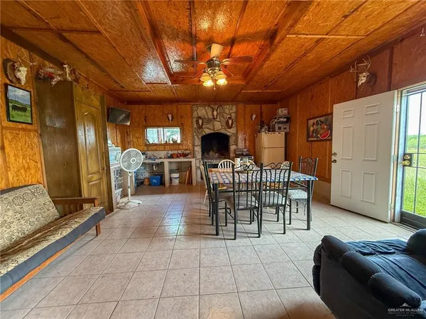 a outdoor space with lots of furniture and chandelier