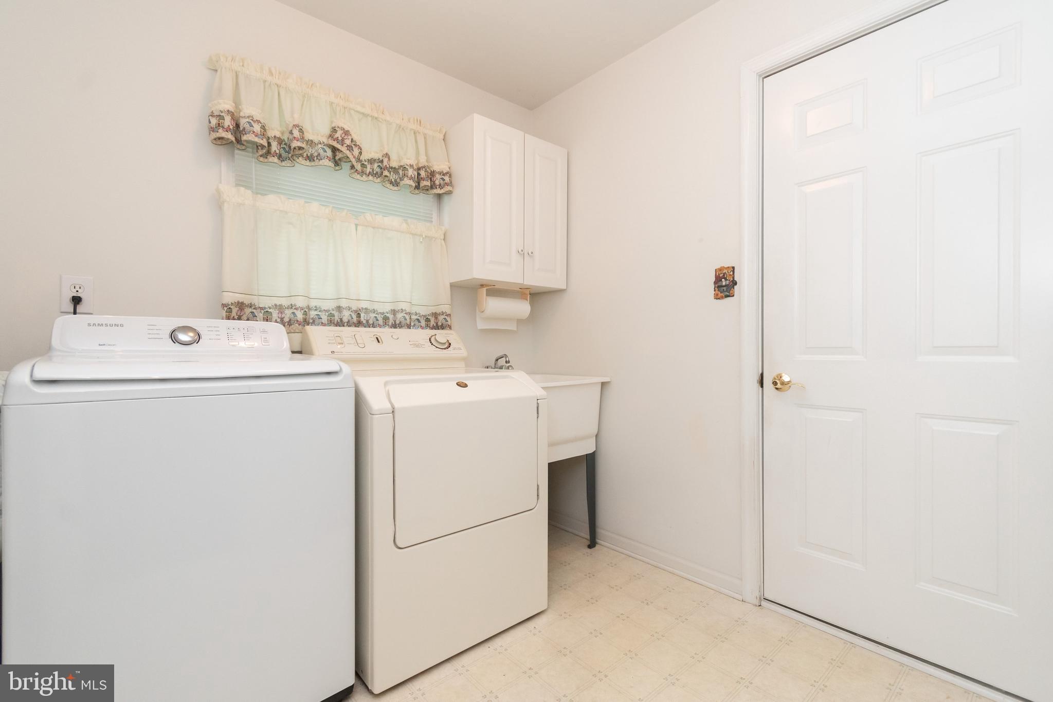 101 Duke Drive Bear, DE 19701 - Photo 25 of 33 Washer Dryer Area w/ Access to Garage