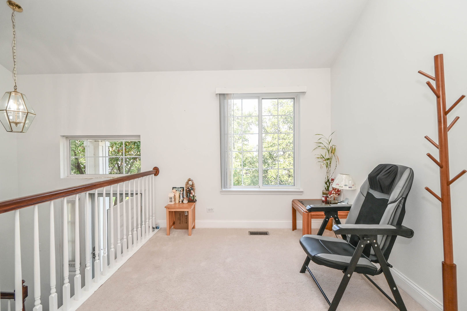 714 South Rosehall Lane Round Lake, IL 60073 - Photo 13 of 35 a view of a workspace with furniture and a window