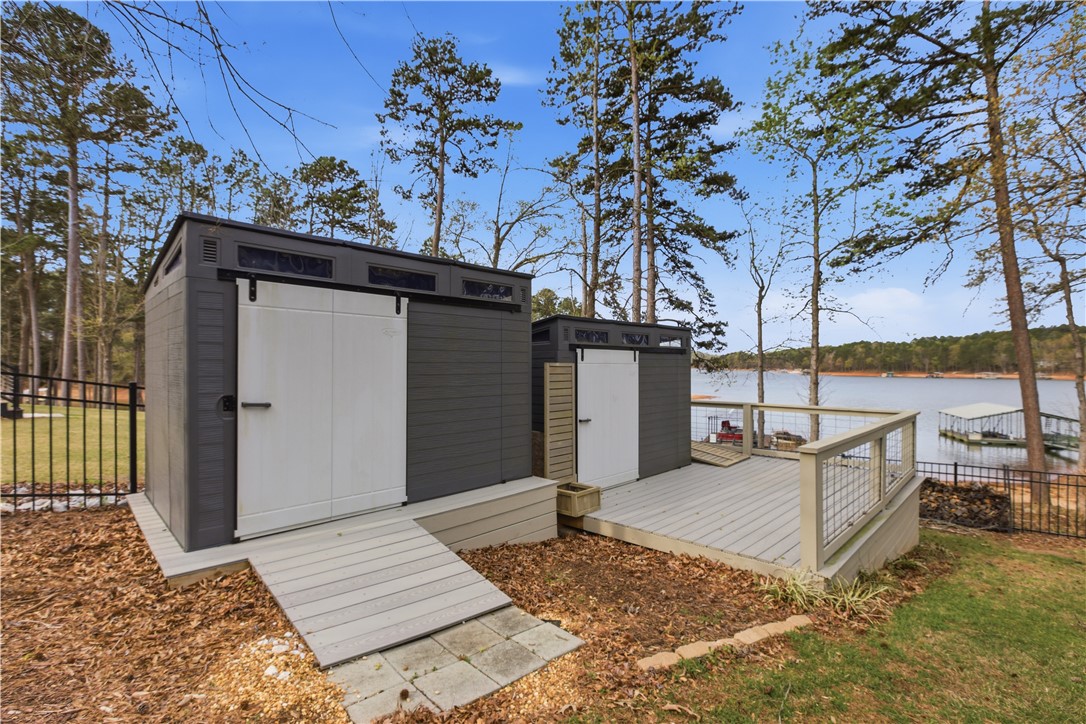 501 Capri Point Lavonia, GA 30553 - Photo 39 of 50 These modern sheds offer practical storage solutions with easy lake access and scenic views.