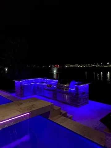 a view of a red chairs in front of building