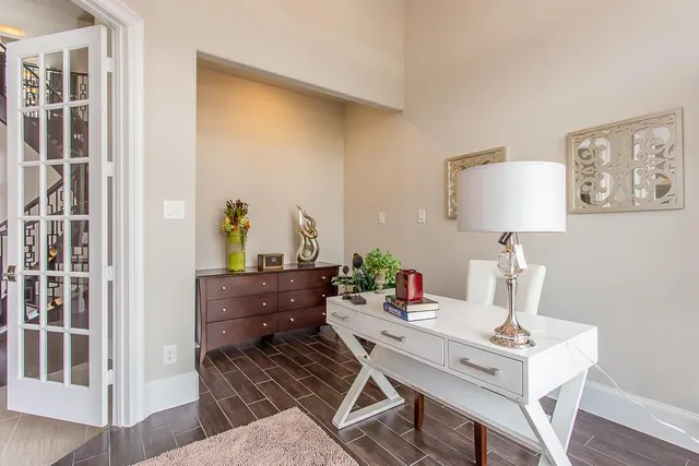 a view of a workspace with furniture