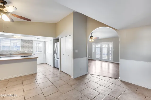 a kitchen with a cabinets and window