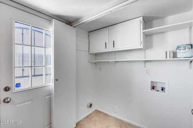 a view of hallway with wooden floor