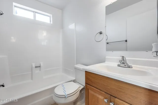 a view of empty room with windows