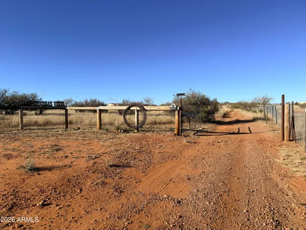 a view of a wooden fence