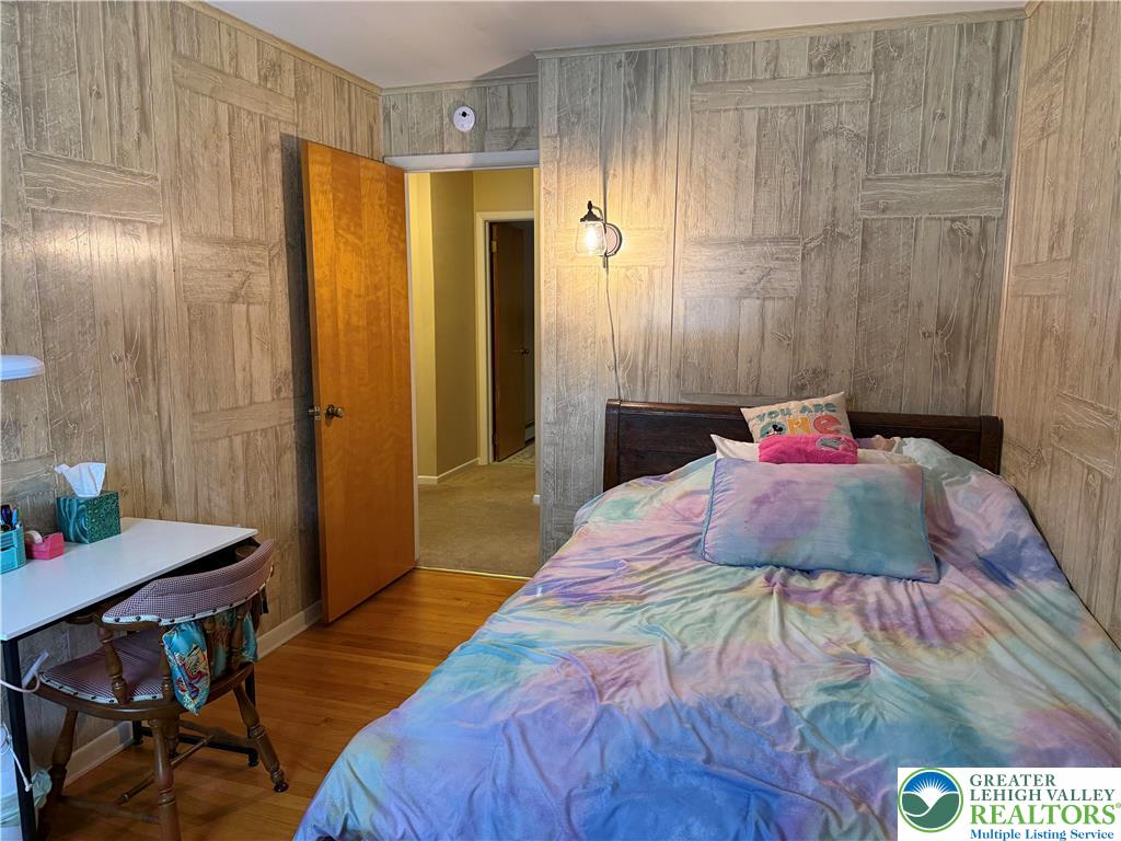 1445 Church Road Wind Gap, PA 18091 - Photo 23 of 37 a bedroom with a bed and a table
