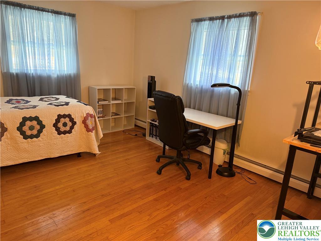 1445 Church Road Wind Gap, PA 18091 - Photo 24 of 37 a bedroom with a bed and a desk