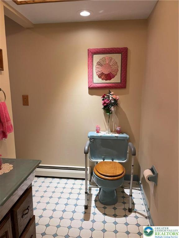1445 Church Road Wind Gap, PA 18091 - Photo 28 of 37 a bathroom with a toilet and a painting on the wall