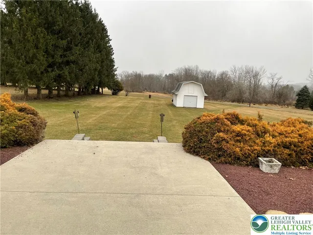 a view of outdoor space yard and swimming pool
