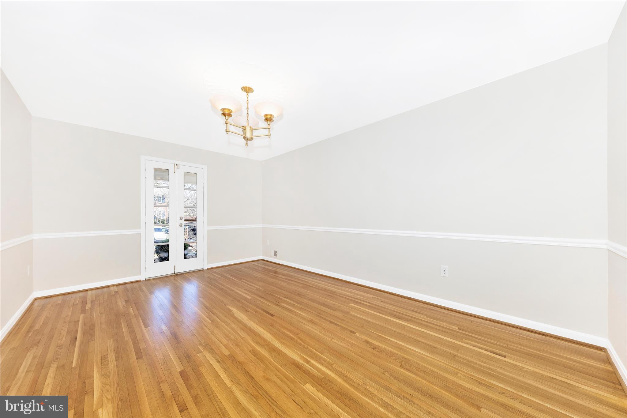 11806 Prestwick Road Potomac, MD 20854 - Photo 16 of 64 a view of a room with wooden floor