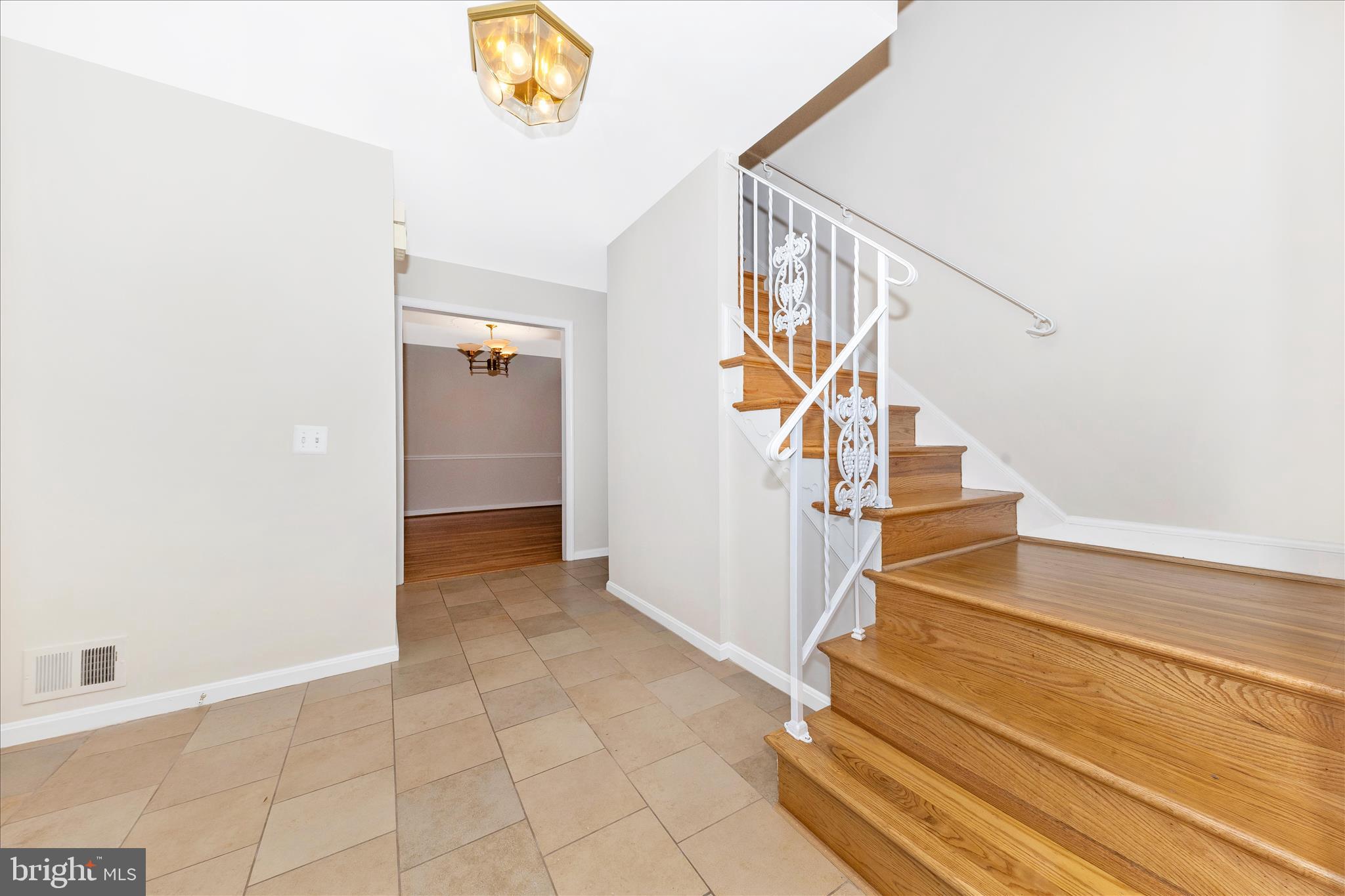 11806 Prestwick Road Potomac, MD 20854 - Photo 17 of 64 a view of entryway and hall with wooden floor