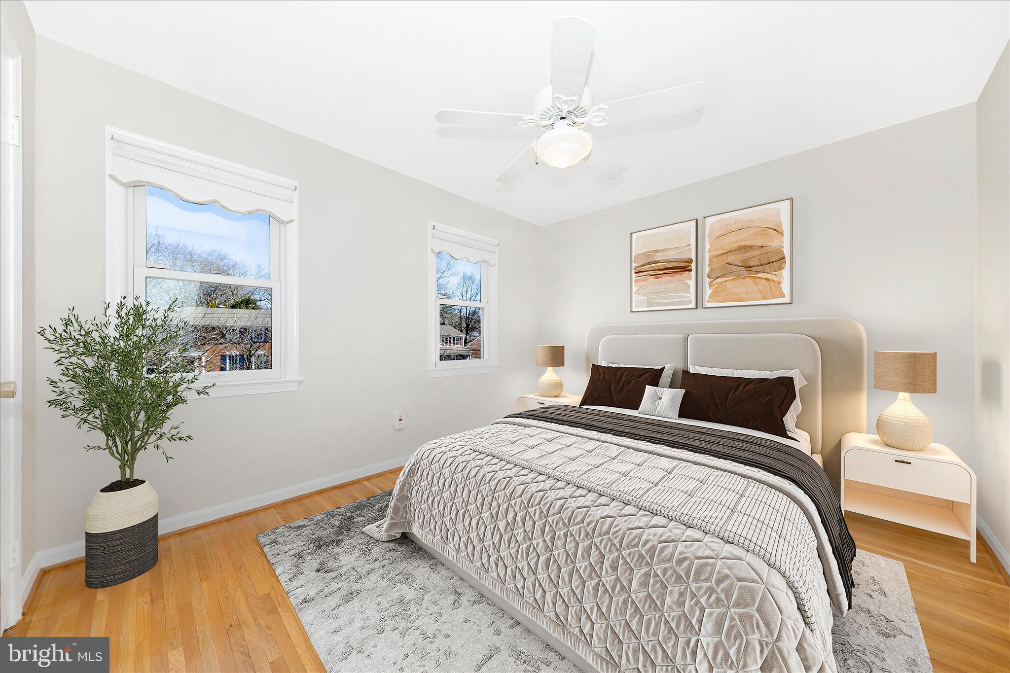 11806 Prestwick Road Potomac, MD 20854 - Photo 24 of 64 a bedroom with a bed and wooden floor