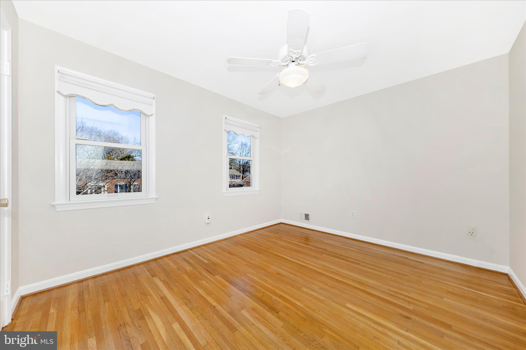 11806 Prestwick Road Potomac, MD 20854 - Photo 33 of 64 a view of an empty room with wooden floor