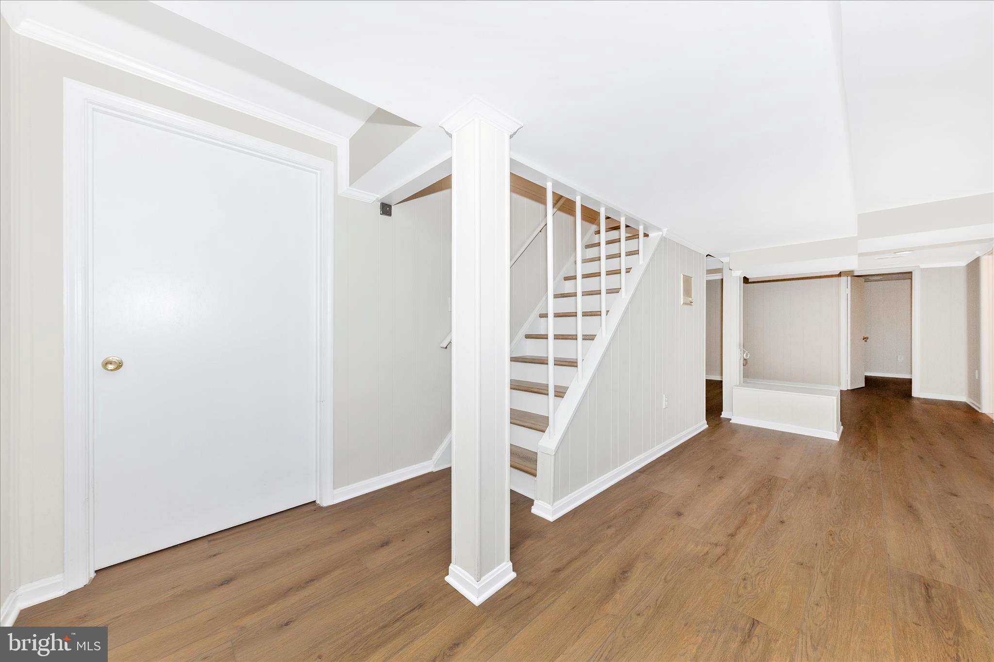 11806 Prestwick Road Potomac, MD 20854 - Photo 38 of 64 wooden floor in an empty room with a window