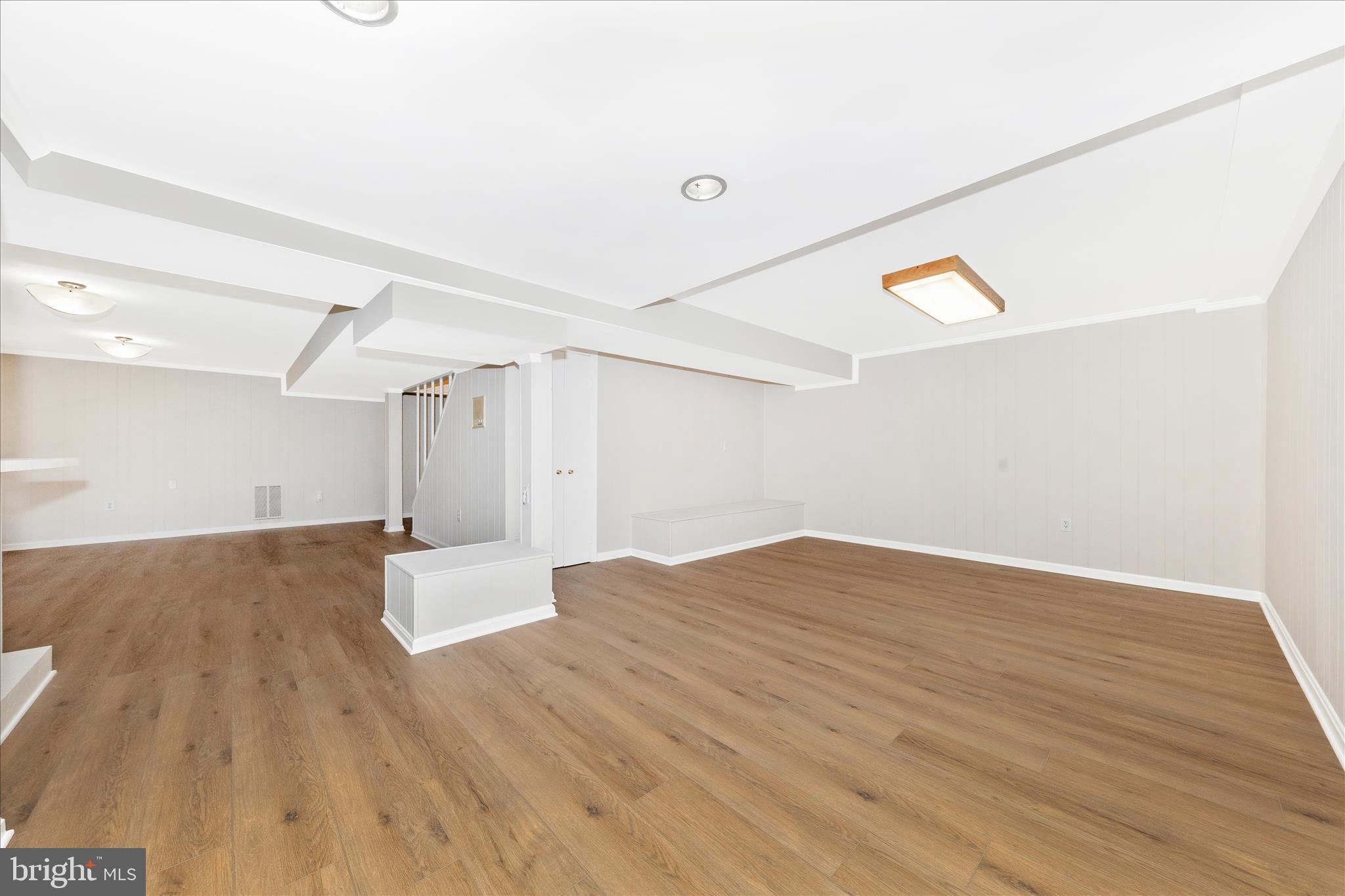 11806 Prestwick Road Potomac, MD 20854 - Photo 45 of 64 a view of empty room with wooden floor