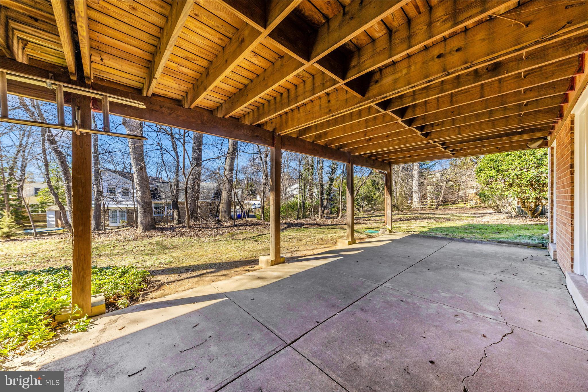 11806 Prestwick Road Potomac, MD 20854 - Photo 58 of 64 a view of a room with wooden floor and iron stairs