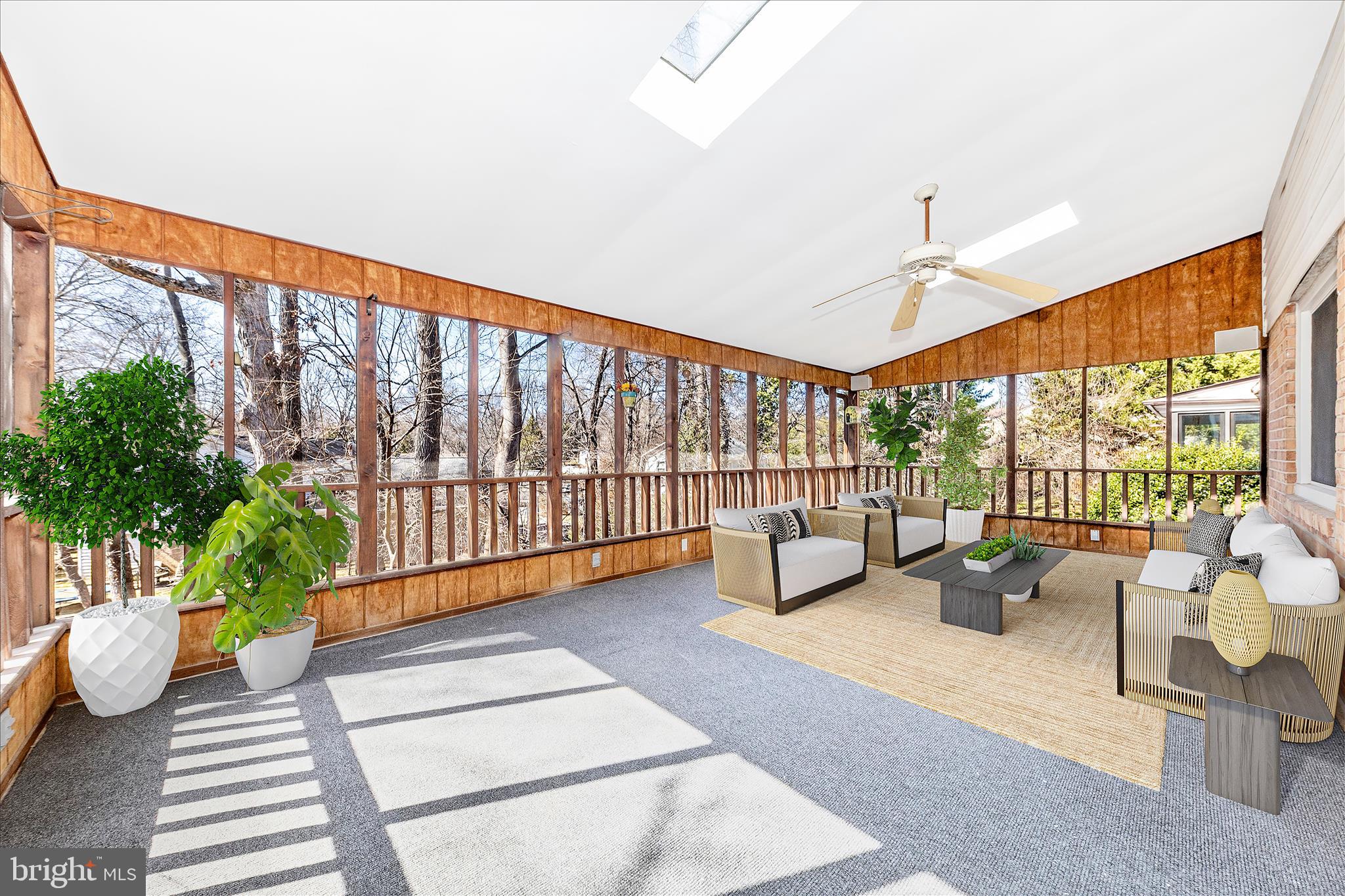 11806 Prestwick Road Potomac, MD 20854 - Photo 7 of 64 a lobby with furniture and floor to ceiling window