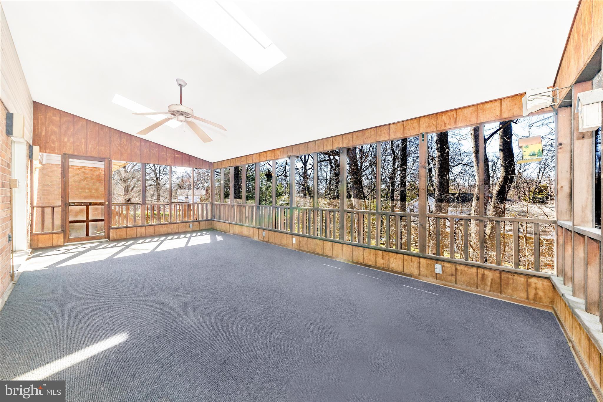 11806 Prestwick Road Potomac, MD 20854 - Photo 8 of 64 a view of an empty room with a balcony