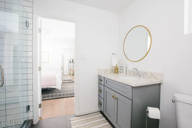 a kitchen with a stove and a microwave