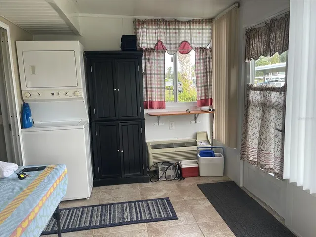 a room with furniture and a window