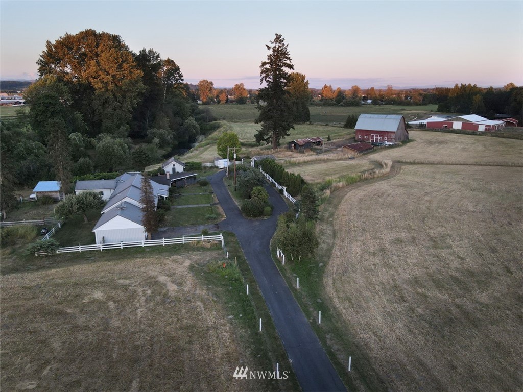 105 Newaukum Valley Road Chehalis, WA 98532 - Photo 14 of 40 a view of a town with barn and mountain view