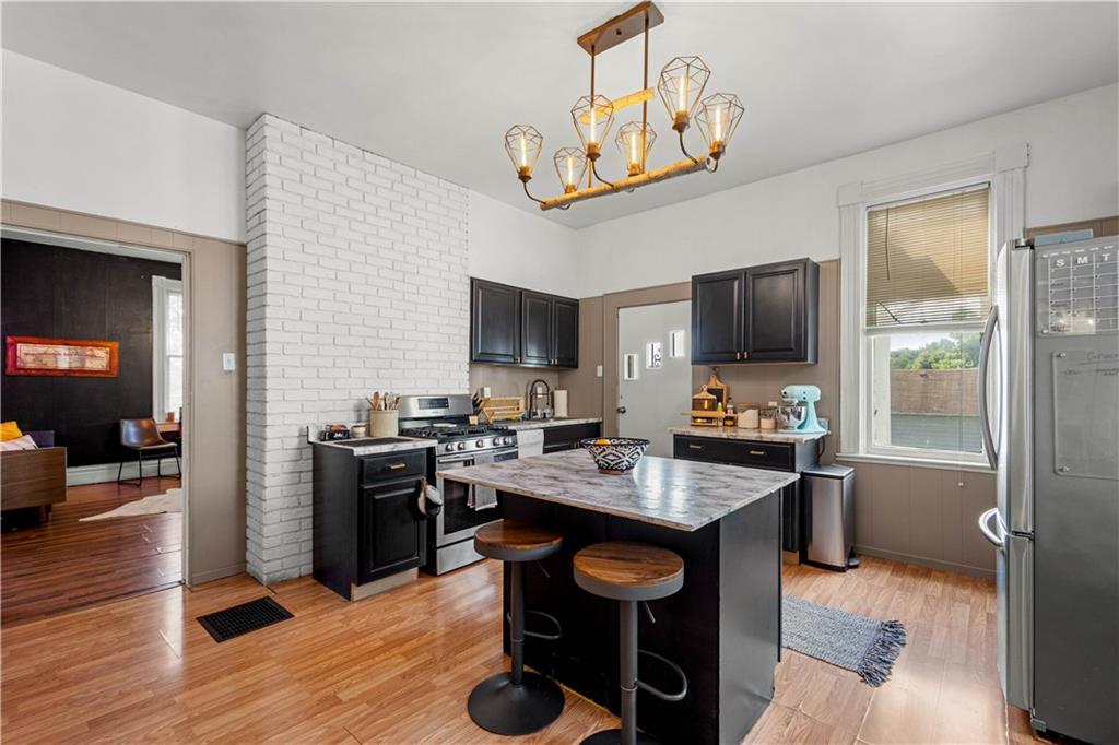34 Altamont Street Washington, PA 15301 - Photo 13 of 38 Huge kitchen that features stainless steel appliances, plenty of counter space, and island.
