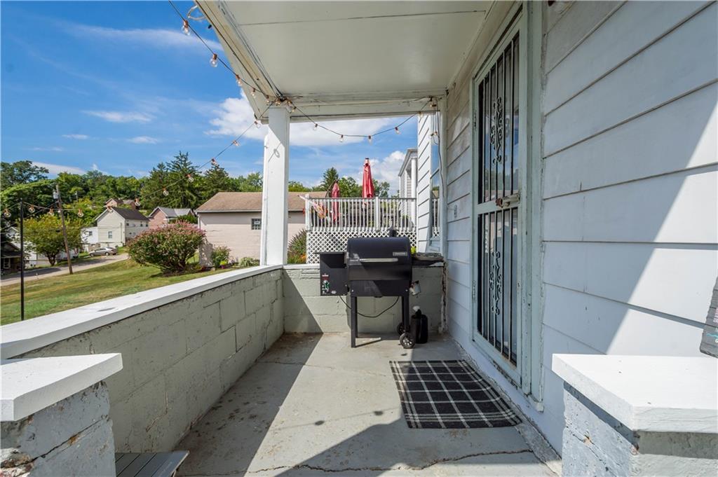 34 Altamont Street Washington, PA 15301 - Photo 30 of 38 Rear covered porch the enjoy the backyard views!