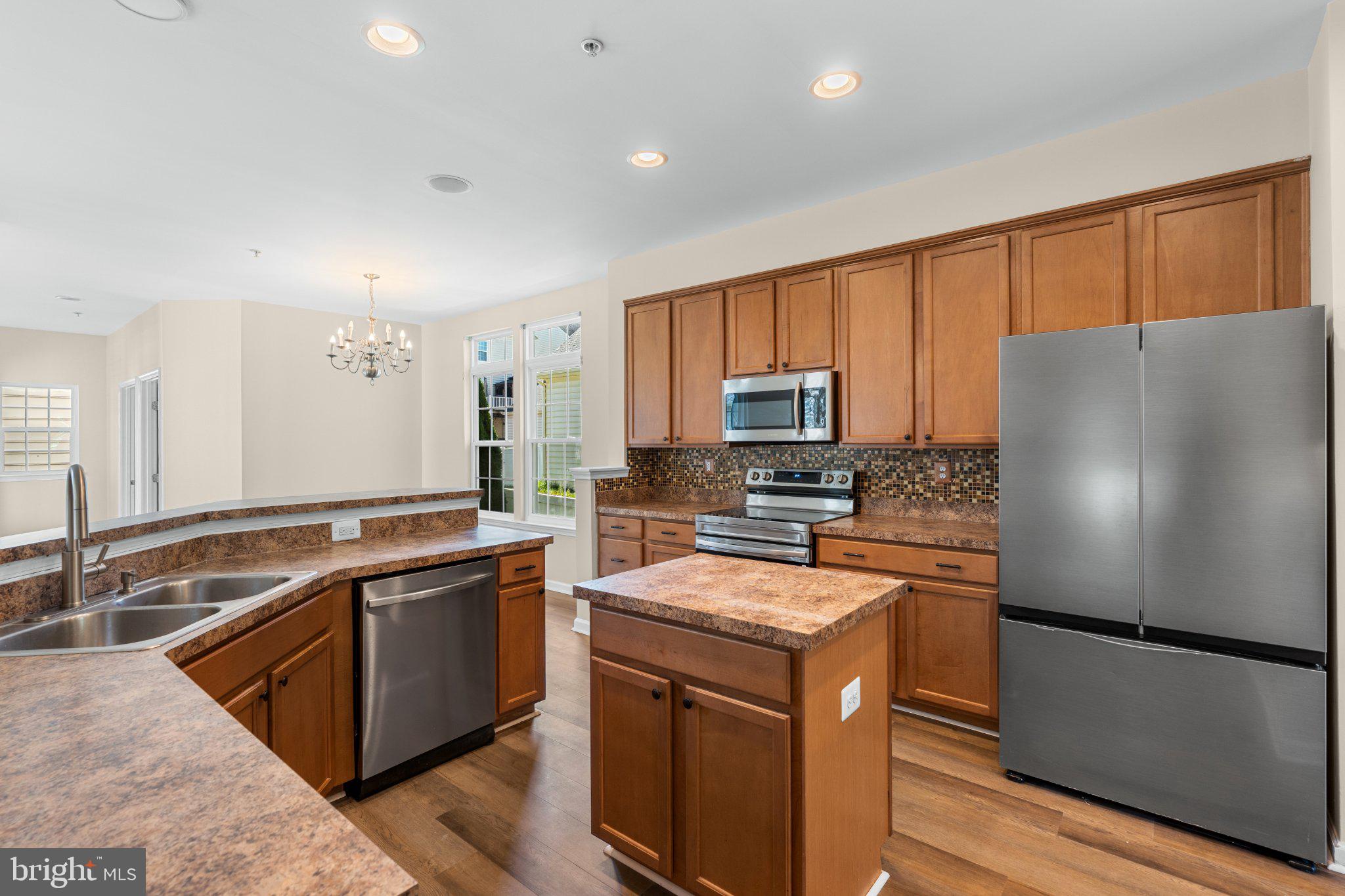 2104 Artillery Road Frederick, MD 21702 - Photo 10 of 42 Kitchen with stainless steel appliances and island