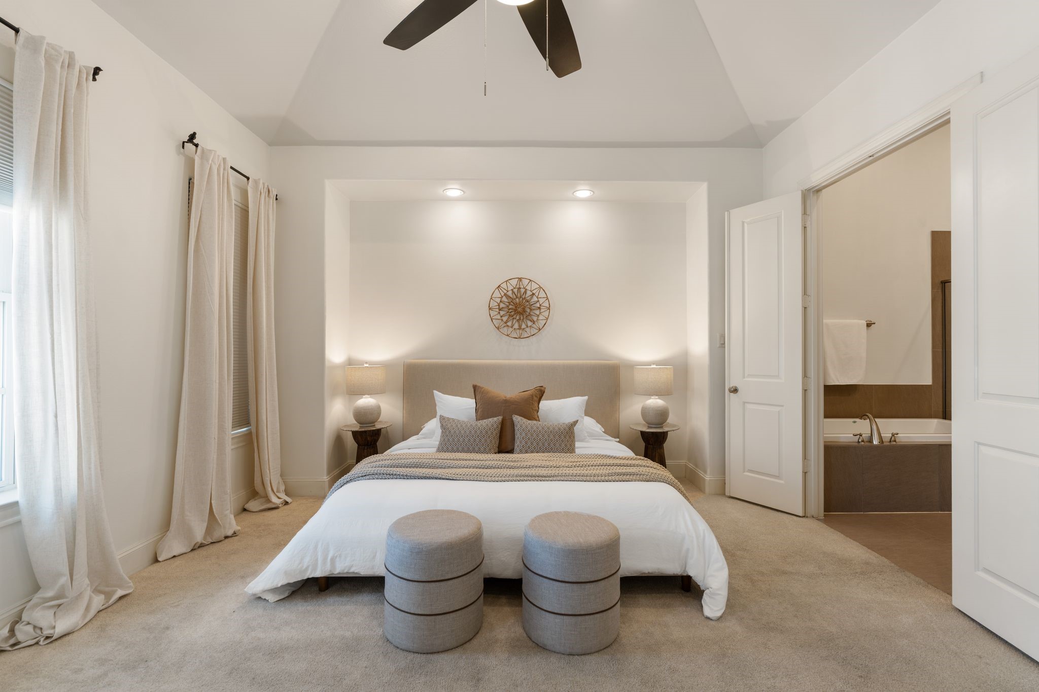 2960 Rusk Street Houston, TX 77003 - Photo 17 of 29 The primary suite is a true sanctuary, boasting soaring high ceilings that enhance its spacious, airy feel.