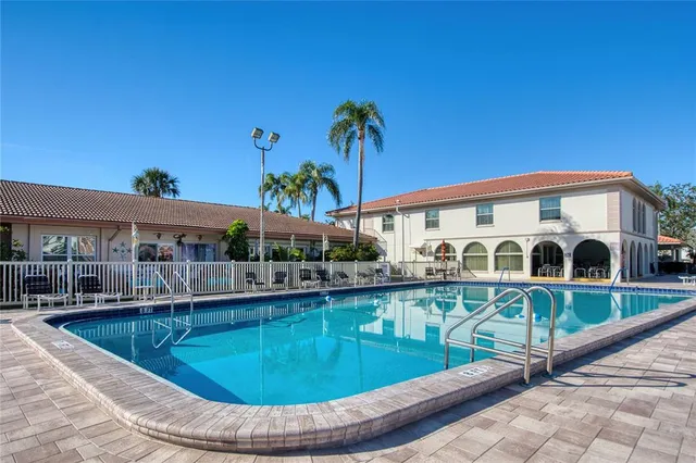 a view of a house with swimming pool