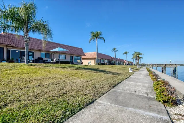 a view of a golf course with a lake