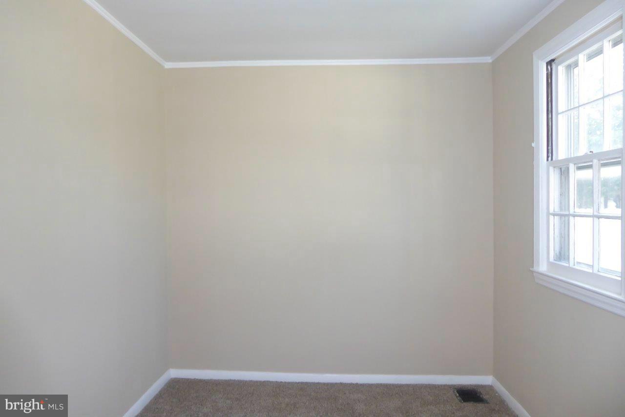 8247 Bullneck Road Baltimore, MD 21222 - Photo 11 of 16 a view of a small space with window