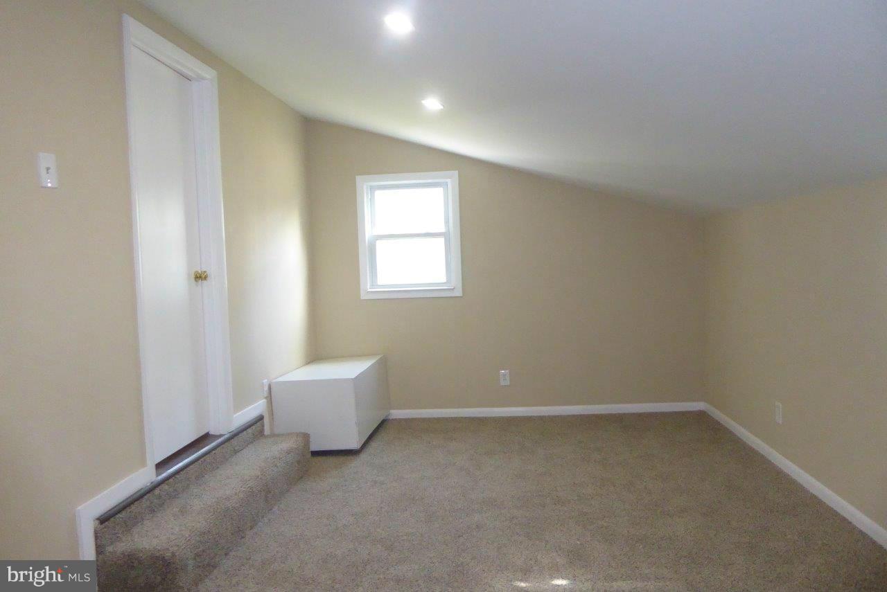 8247 Bullneck Road Baltimore, MD 21222 - Photo 15 of 16 an empty room with a window